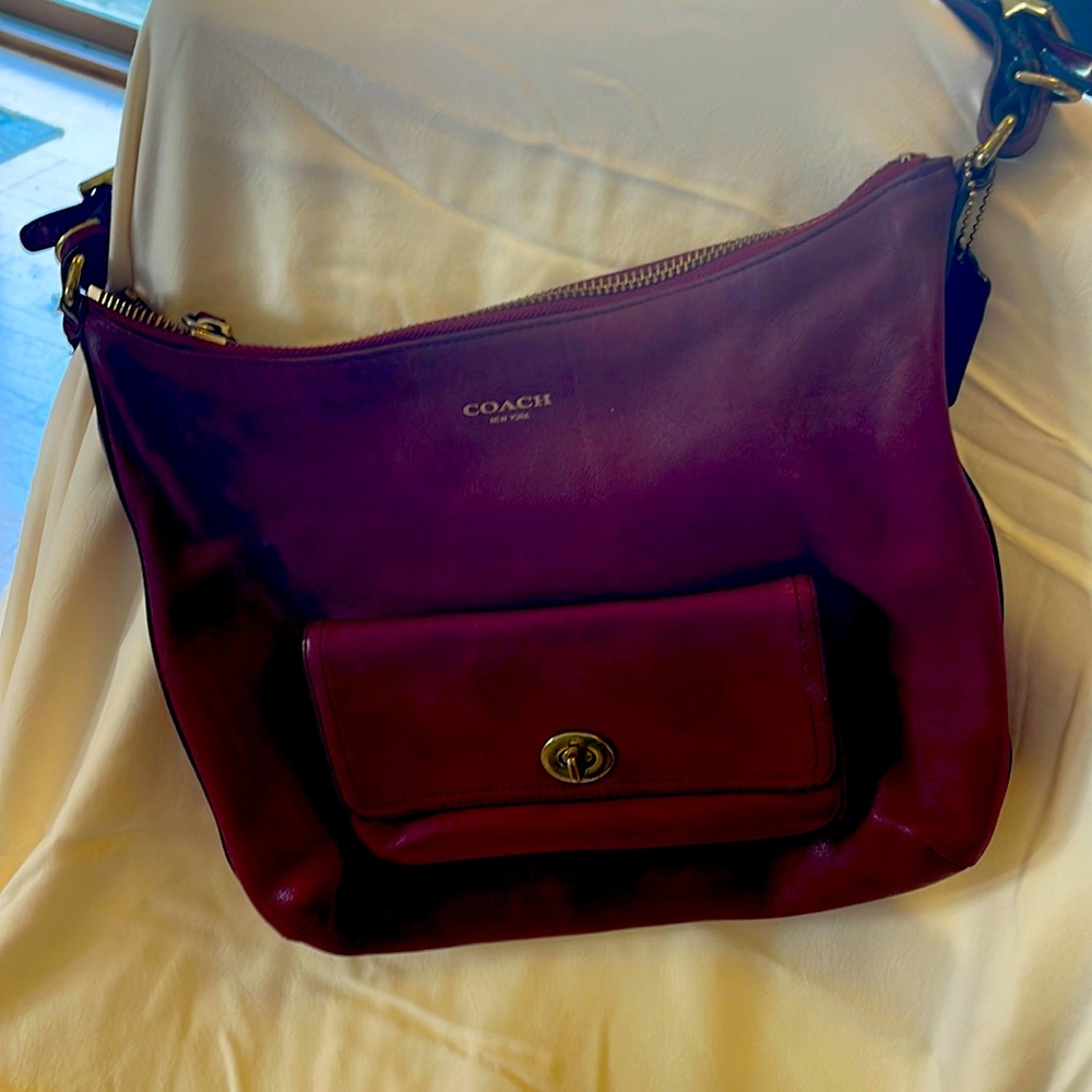 Burgundy coach purse. Slightly used. Adjustable shoulder strap